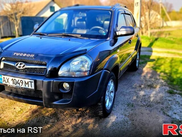 Серый Хендай Туксон, объемом двигателя 2 л и пробегом 190 тыс. км за 8500 $, фото 1 на Automoto.ua