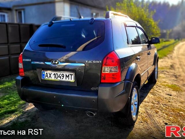 Серый Хендай Туксон, объемом двигателя 2 л и пробегом 190 тыс. км за 8500 $, фото 6 на Automoto.ua