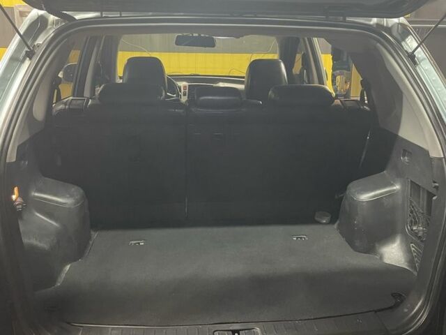 Сірий Хендай Туксон, об'ємом двигуна 2 л та пробігом 195 тис. км за 7500 $, фото 6 на Automoto.ua