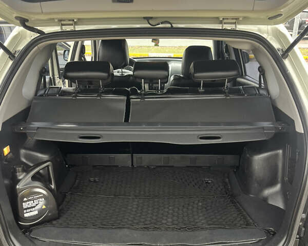 Серый Хендай Туксон, объемом двигателя 1.98 л и пробегом 151 тыс. км за 8100 $, фото 9 на Automoto.ua