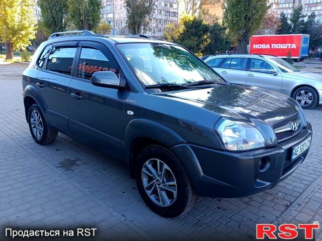 Сірий Хендай Туксон, об'ємом двигуна 2 л та пробігом 216 тис. км за 8200 $, фото 9 на Automoto.ua