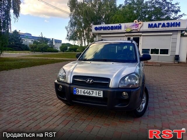 Серый Хендай Туксон, объемом двигателя 2.7 л и пробегом 280 тыс. км за 6500 $, фото 7 на Automoto.ua