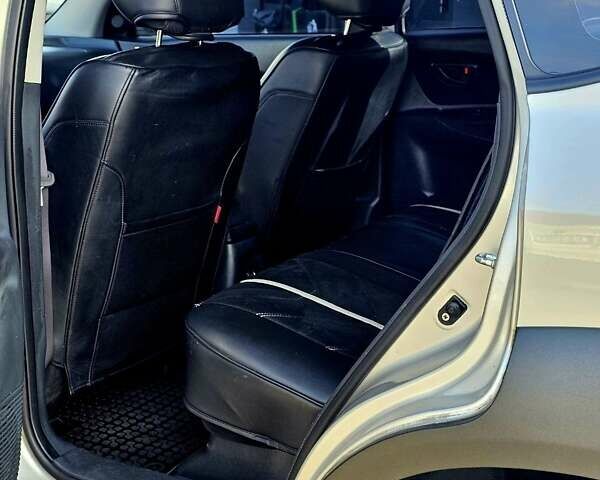 Серый Хендай Туксон, объемом двигателя 1.98 л и пробегом 199 тыс. км за 8350 $, фото 13 на Automoto.ua