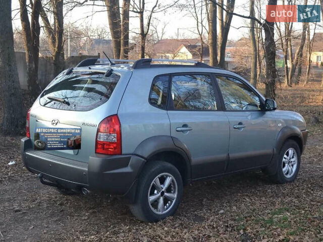 Сірий Хендай Туксон, об'ємом двигуна 2.02 л та пробігом 226 тис. км за 9200 $, фото 21 на Automoto.ua