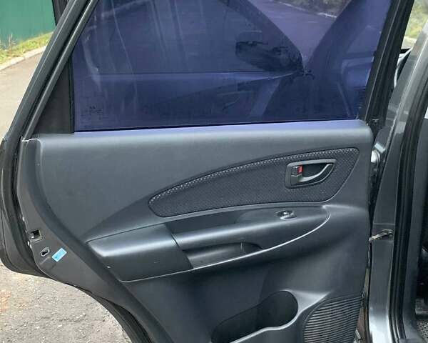 Сірий Хендай Туксон, об'ємом двигуна 1.98 л та пробігом 170 тис. км за 8800 $, фото 8 на Automoto.ua