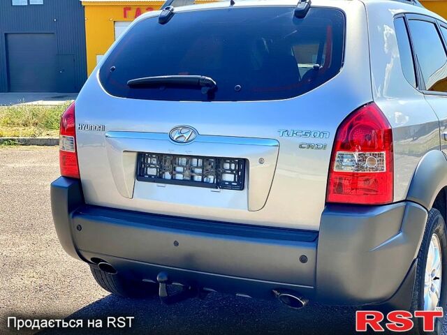 Сірий Хендай Туксон, об'ємом двигуна 2 л та пробігом 225 тис. км за 7800 $, фото 1 на Automoto.ua