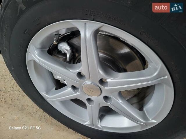 Серый Хендай Туксон, объемом двигателя 1.99 л и пробегом 302 тыс. км за 9300 $, фото 24 на Automoto.ua