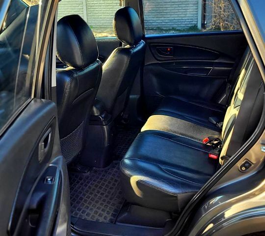 Серый Хендай Туксон, объемом двигателя 2 л и пробегом 190 тыс. км за 8500 $, фото 12 на Automoto.ua