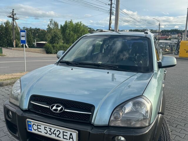 Серый Хендай Туксон, объемом двигателя 2 л и пробегом 240 тыс. км за 6500 $, фото 3 на Automoto.ua