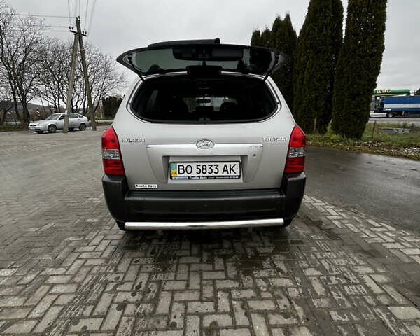 Сірий Хендай Туксон, об'ємом двигуна 1.98 л та пробігом 36 тис. км за 12800 $, фото 7 на Automoto.ua