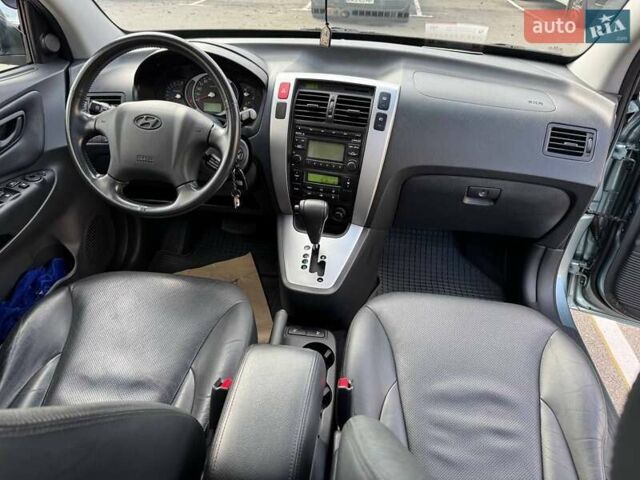 Серый Хендай Туксон, объемом двигателя 2 л и пробегом 48 тыс. км за 11800 $, фото 19 на Automoto.ua