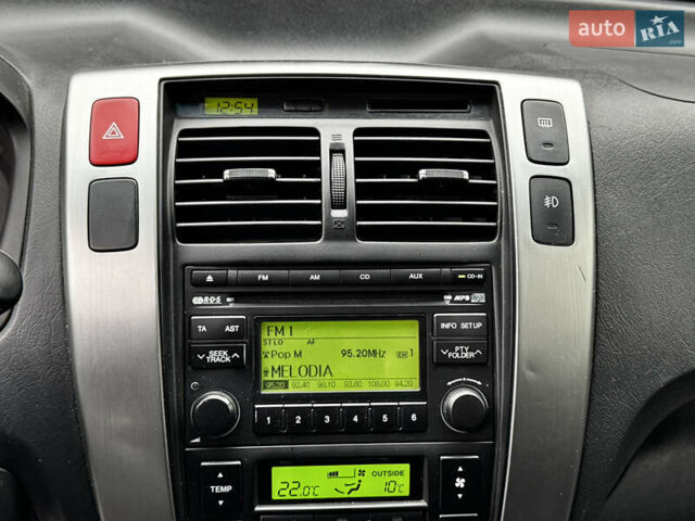 Сірий Хендай Туксон, об'ємом двигуна 2 л та пробігом 213 тис. км за 8500 $, фото 36 на Automoto.ua