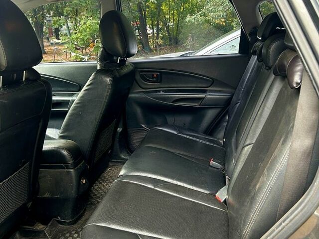 Серый Хендай Туксон, объемом двигателя 2 л и пробегом 221 тыс. км за 8500 $, фото 5 на Automoto.ua