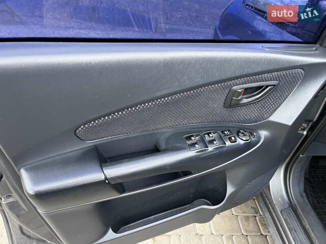 Серый Хендай Туксон, объемом двигателя 2 л и пробегом 198 тыс. км за 8900 $, фото 2 на Automoto.ua