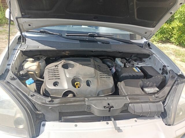 Серый Хендай Туксон, объемом двигателя 2 л и пробегом 257 тыс. км за 9000 $, фото 12 на Automoto.ua