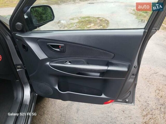 Серый Хендай Туксон, объемом двигателя 1.99 л и пробегом 302 тыс. км за 9300 $, фото 20 на Automoto.ua