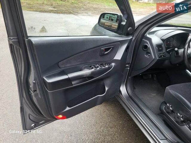 Серый Хендай Туксон, объемом двигателя 1.99 л и пробегом 302 тыс. км за 9300 $, фото 18 на Automoto.ua