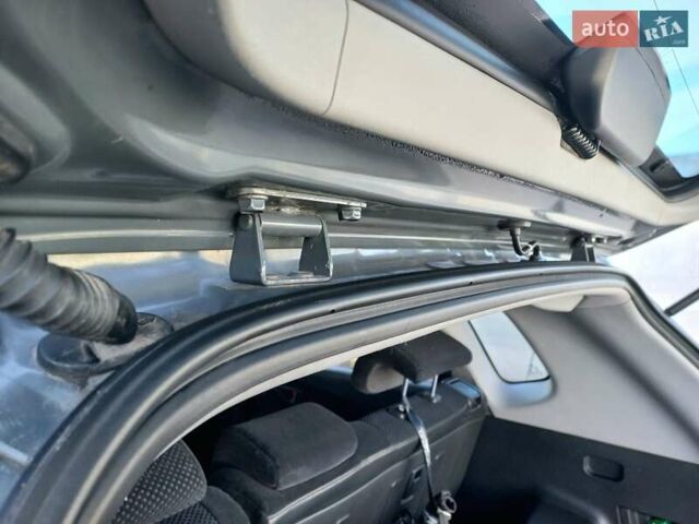 Серый Хендай Туксон, объемом двигателя 2 л и пробегом 207 тыс. км за 8000 $, фото 8 на Automoto.ua