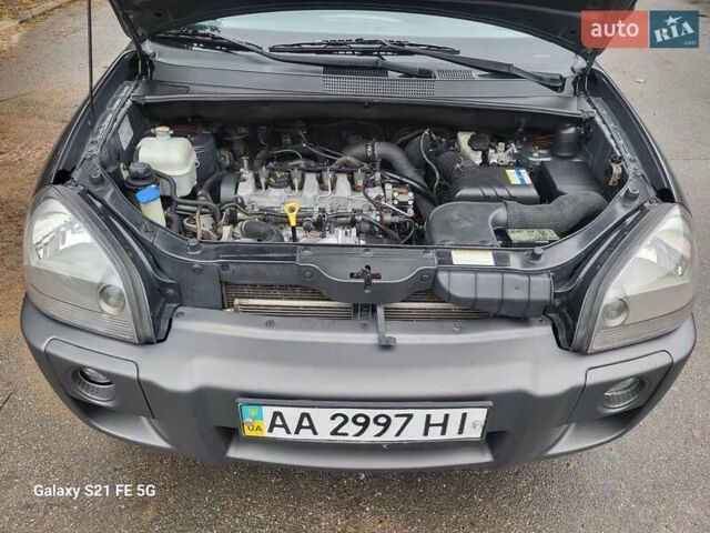 Серый Хендай Туксон, объемом двигателя 1.99 л и пробегом 302 тыс. км за 9300 $, фото 23 на Automoto.ua