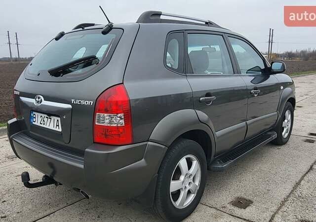 Серый Хендай Туксон, объемом двигателя 1.98 л и пробегом 177 тыс. км за 8200 $, фото 17 на Automoto.ua
