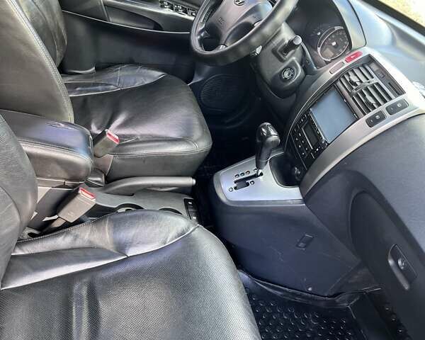 Серый Хендай Туксон, объемом двигателя 1.98 л и пробегом 220 тыс. км за 8500 $, фото 11 на Automoto.ua