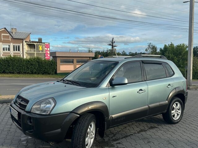 Серый Хендай Туксон, объемом двигателя 2 л и пробегом 240 тыс. км за 6500 $, фото 5 на Automoto.ua