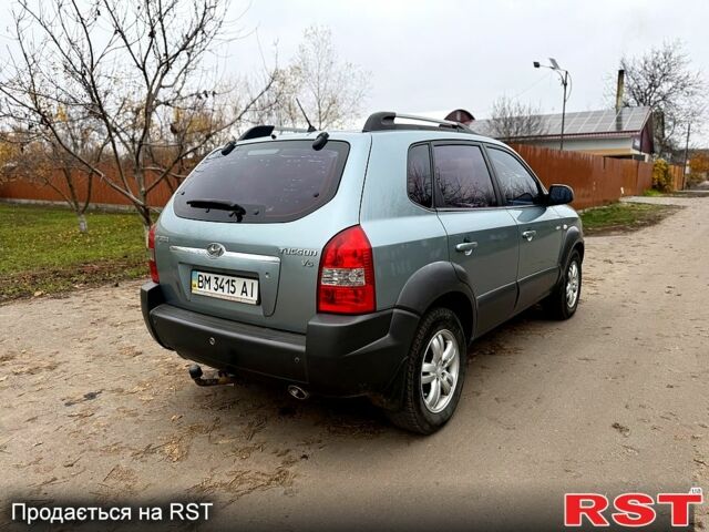 Серый Хендай Туксон, объемом двигателя 2.7 л и пробегом 228 тыс. км за 7650 $, фото 4 на Automoto.ua