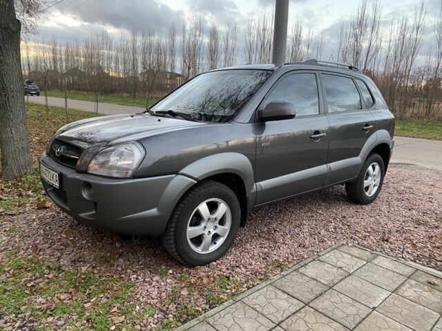 Сірий Хендай Туксон, об'ємом двигуна 2 л та пробігом 170 тис. км за 7600 $, фото 7 на Automoto.ua