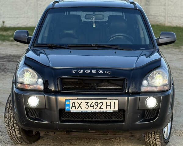 Сірий Хендай Туксон, об'ємом двигуна 1.98 л та пробігом 220 тис. км за 8200 $, фото 1 на Automoto.ua