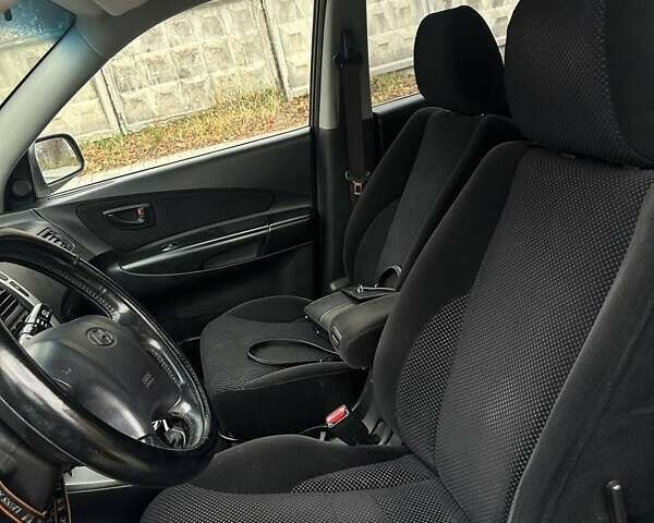 Сірий Хендай Туксон, об'ємом двигуна 1.99 л та пробігом 221 тис. км за 6000 $, фото 15 на Automoto.ua