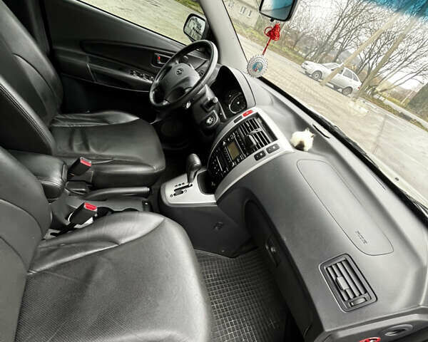 Сірий Хендай Туксон, об'ємом двигуна 1.98 л та пробігом 36 тис. км за 12800 $, фото 5 на Automoto.ua