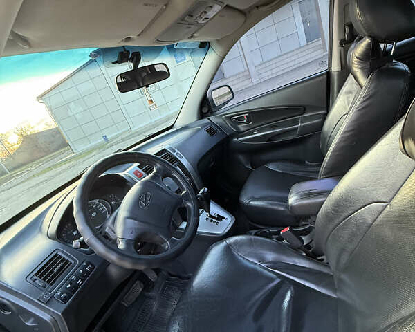 Сірий Хендай Туксон, об'ємом двигуна 1.98 л та пробігом 220 тис. км за 8200 $, фото 14 на Automoto.ua