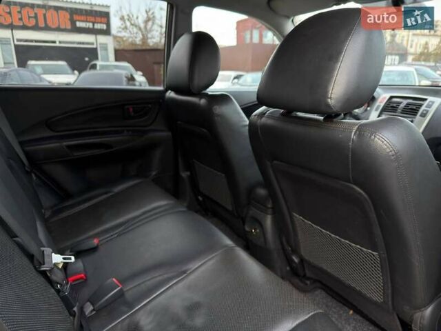 Серый Хендай Туксон, объемом двигателя 1.98 л и пробегом 140 тыс. км за 9300 $, фото 28 на Automoto.ua