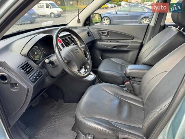 Серый Хендай Туксон, объемом двигателя 2 л и пробегом 48 тыс. км за 11800 $, фото 3 на Automoto.ua