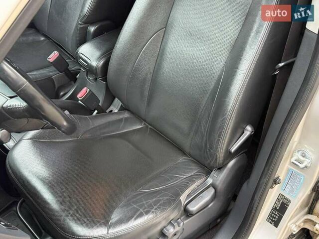 Серый Хендай Туксон, объемом двигателя 2.7 л и пробегом 210 тыс. км за 9290 $, фото 14 на Automoto.ua