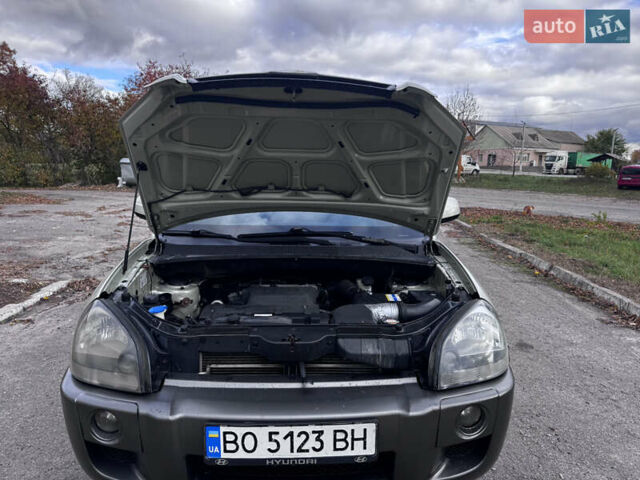 Серый Хендай Туксон, объемом двигателя 2 л и пробегом 228 тыс. км за 6900 $, фото 14 на Automoto.ua