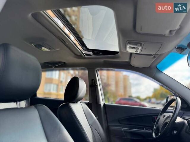 Серый Хендай Туксон, объемом двигателя 2 л и пробегом 48 тыс. км за 11800 $, фото 12 на Automoto.ua