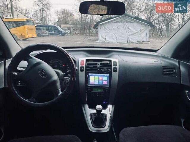 Серый Хендай Туксон, объемом двигателя 2 л и пробегом 171 тыс. км за 9300 $, фото 15 на Automoto.ua