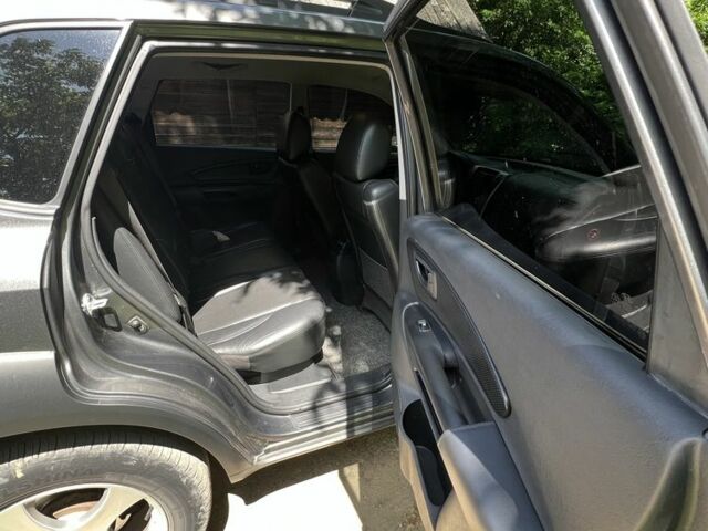 Хендай Туксон 2008 в Мукачеве на Automoto.ua Серый Хендай Туксон, объемом двигателя 2 л и пробегом 300 тыс. км за 7800 $, фото 7 на Automoto.ua