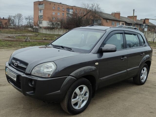 Сірий Хендай Туксон, об'ємом двигуна 2 л та пробігом 95 тис. км за 8800 $, фото 7 на Automoto.ua