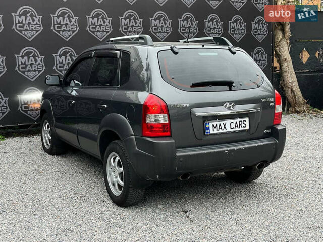 Серый Хендай Туксон, объемом двигателя 2.7 л и пробегом 239 тыс. км за 7400 $, фото 4 на Automoto.ua