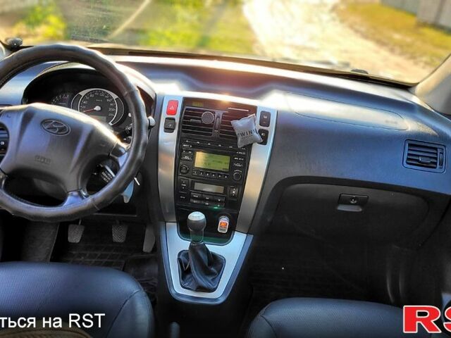 Серый Хендай Туксон, объемом двигателя 2 л и пробегом 190 тыс. км за 8500 $, фото 8 на Automoto.ua