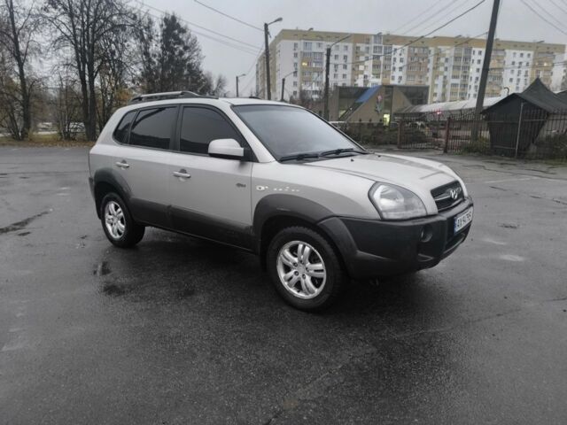 Сірий Хендай Туксон, об'ємом двигуна 2 л та пробігом 215 тис. км за 7750 $, фото 5 на Automoto.ua