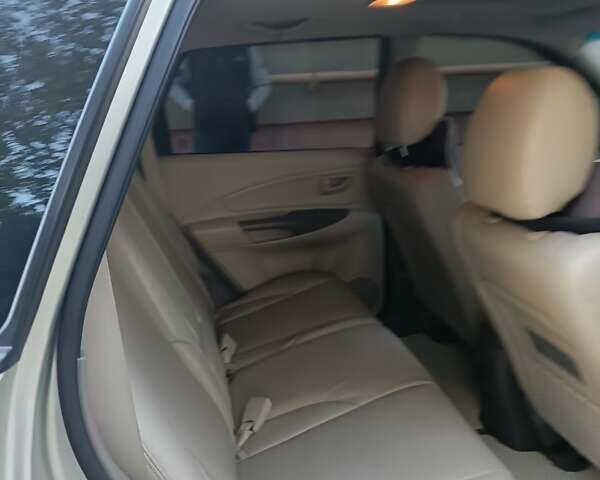 Сірий Хендай Туксон, об'ємом двигуна 2 л та пробігом 97 тис. км за 9500 $, фото 4 на Automoto.ua