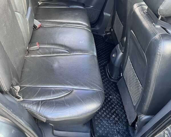 Серый Хендай Туксон, объемом двигателя 1.98 л и пробегом 220 тыс. км за 8500 $, фото 12 на Automoto.ua