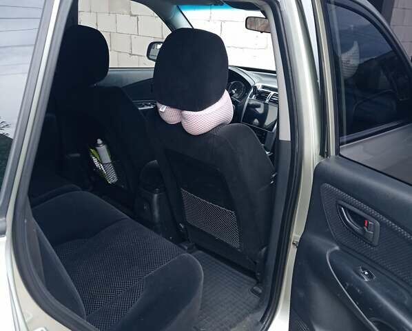 Серый Хендай Туксон, объемом двигателя 2 л и пробегом 360 тыс. км за 7700 $, фото 4 на Automoto.ua