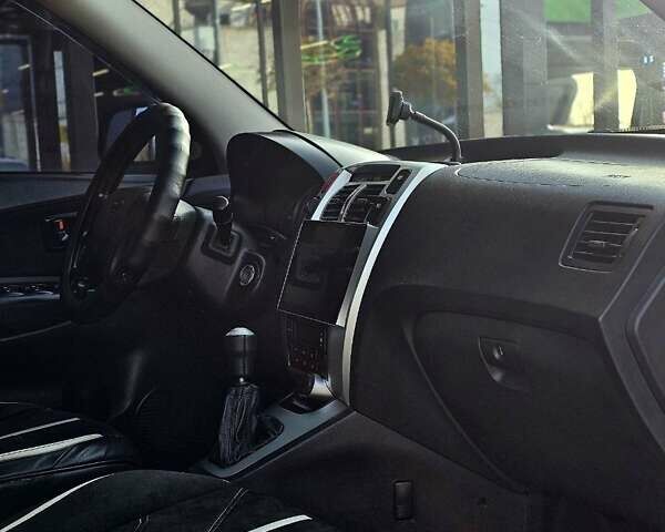 Серый Хендай Туксон, объемом двигателя 1.98 л и пробегом 199 тыс. км за 8350 $, фото 8 на Automoto.ua