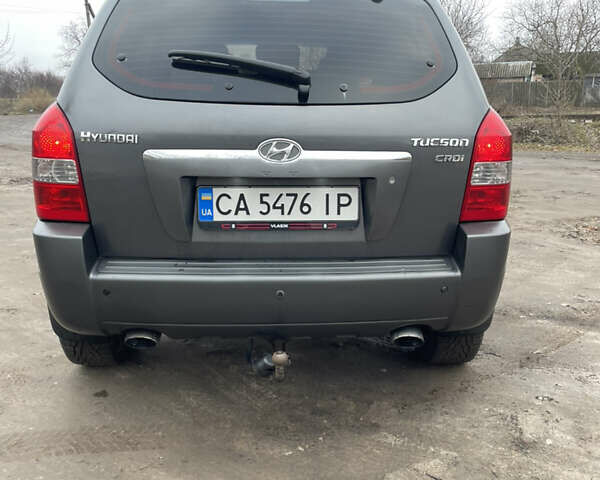 Сірий Хендай Туксон, об'ємом двигуна 1.99 л та пробігом 203 тис. км за 8550 $, фото 8 на Automoto.ua