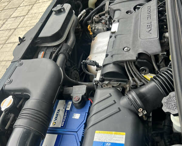 Сірий Хендай Туксон, об'ємом двигуна 1.98 л та пробігом 130 тис. км за 8900 $, фото 17 на Automoto.ua
