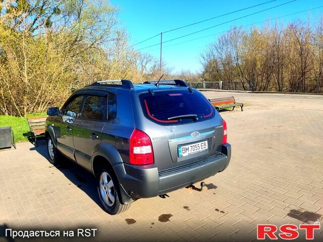 Серый Хендай Туксон, объемом двигателя 2 л и пробегом 210 тыс. км за 7200 $, фото 6 на Automoto.ua